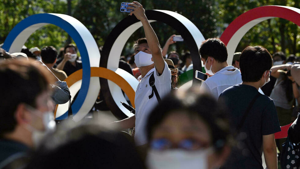 Crowds gather outside Tokyo stadium for Olympics opening ceremony
