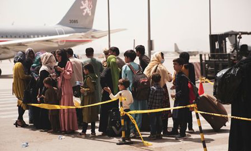 Civilians leaving Afghanistan from the Hamid Karzai International Airport in Kabul
