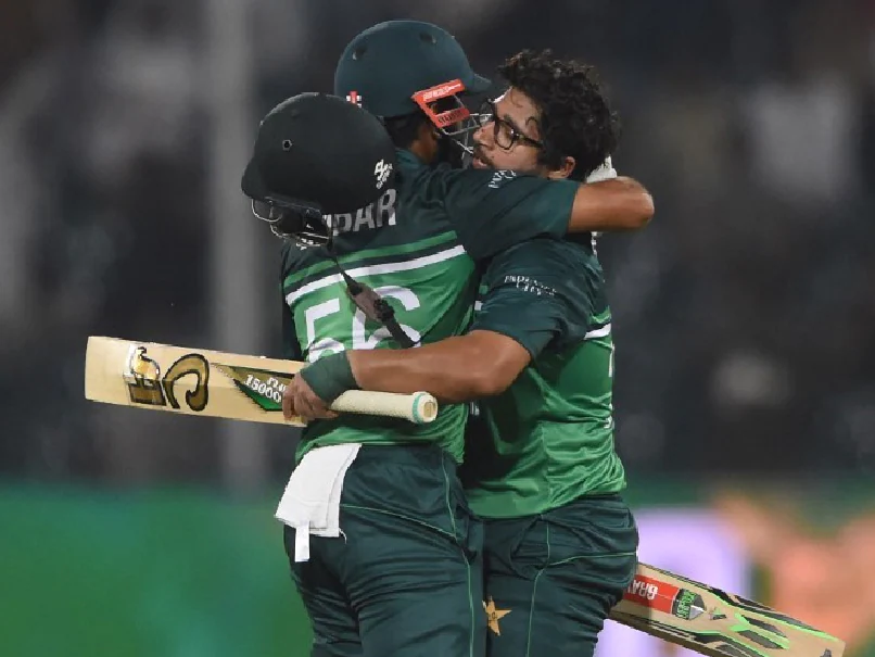 Babar and Imam embracing each other after a historic win against Australia