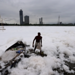 Chhath Puja Devotees Bathe in Toxic Foam Of Yamuna River